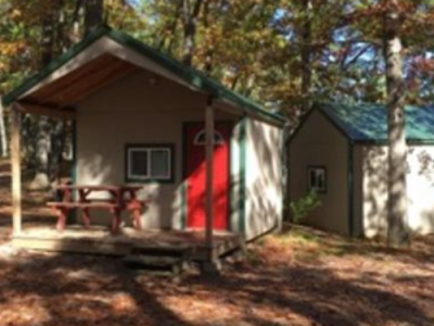 Rustic Cabin Rentals at CreationView Campground | Michigan's Irish Hills Rustic cabin rentals at CreationView Campground in Michigan's Irish Hills with a wooded campsite setting